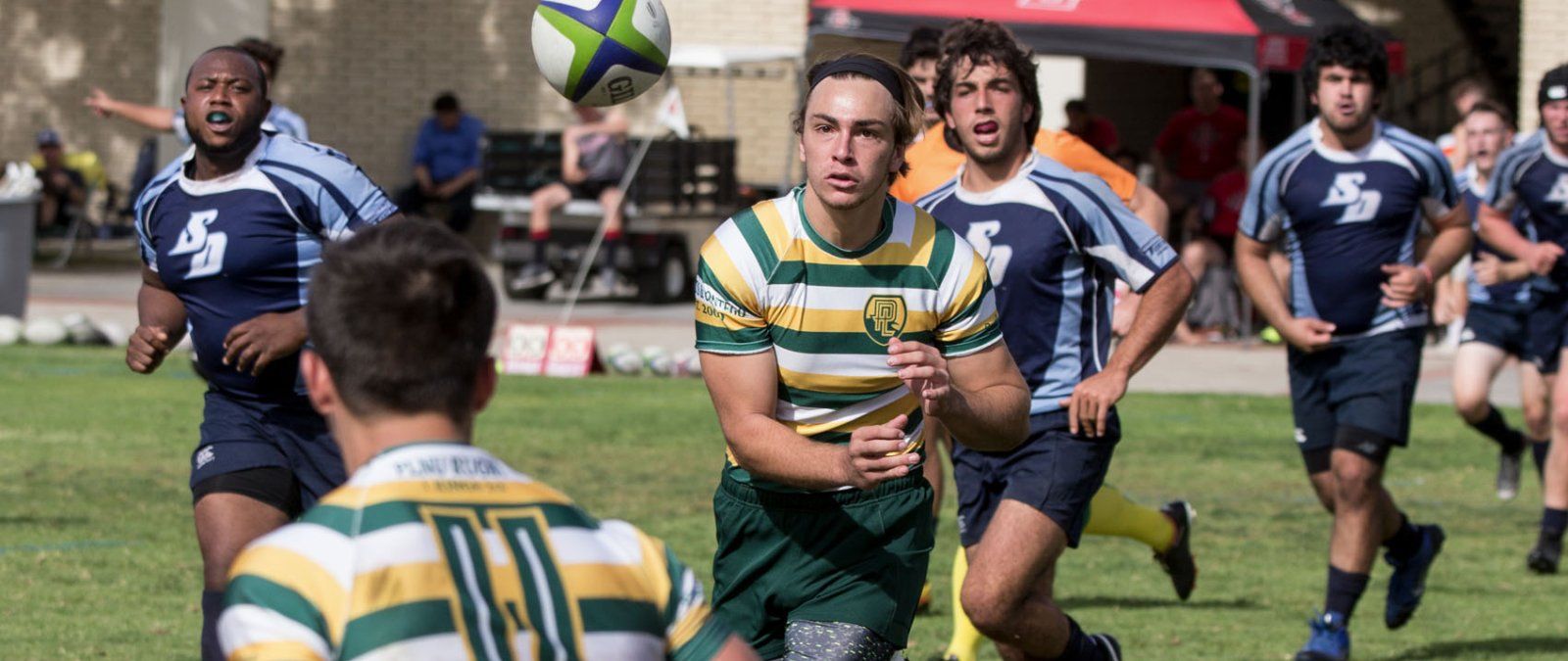 鶹's rugby team competes against the University of San Diego in a local tournament.